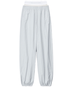 Track pants with pre-styled underwear