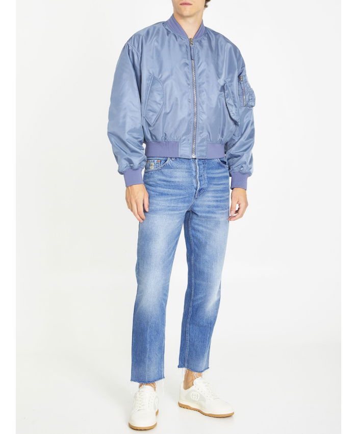 GUCCI - Jeans in denim délavé