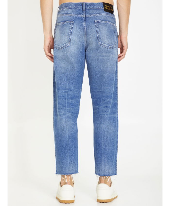 GUCCI - Jeans in denim délavé