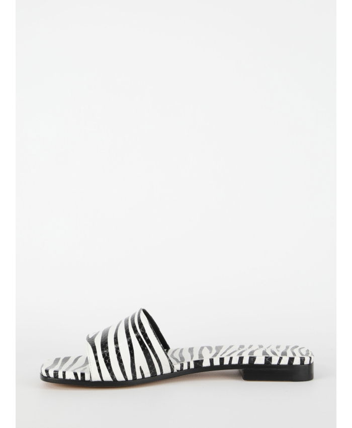 PARIS TEXAS - Zebra-print flat sandals