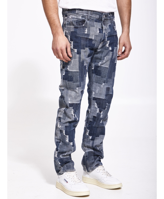 MARCELO BURLON - Jeans in denim patchwork
