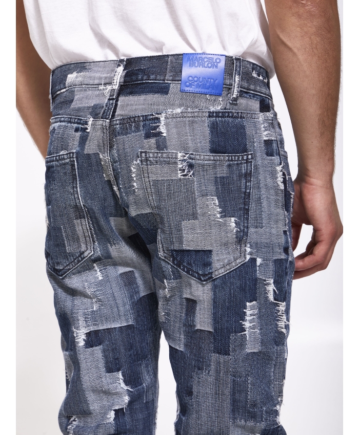MARCELO BURLON - Patchwork denim jeans