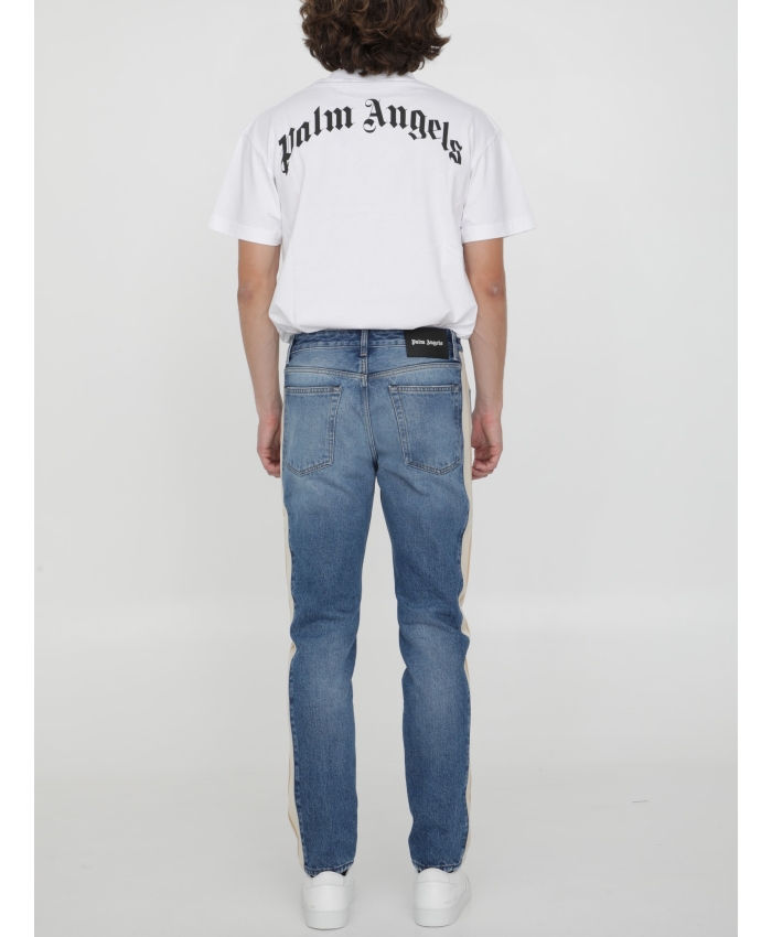 PALM ANGELS - Jeans con bande laterali