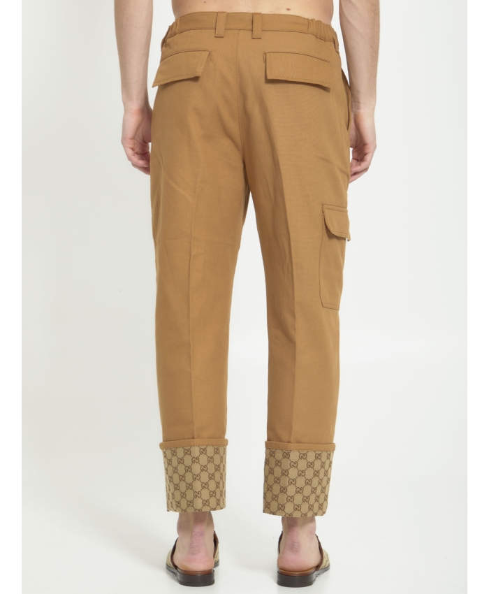 GUCCI - Beige trousers with GG cuff
